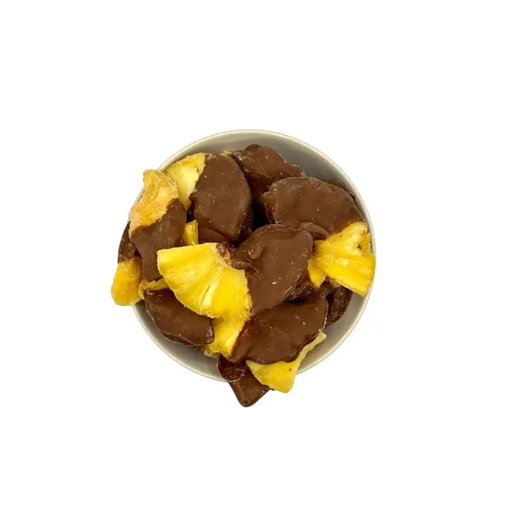 Ananas Stücke gedippt in Vollmilch Schokolade