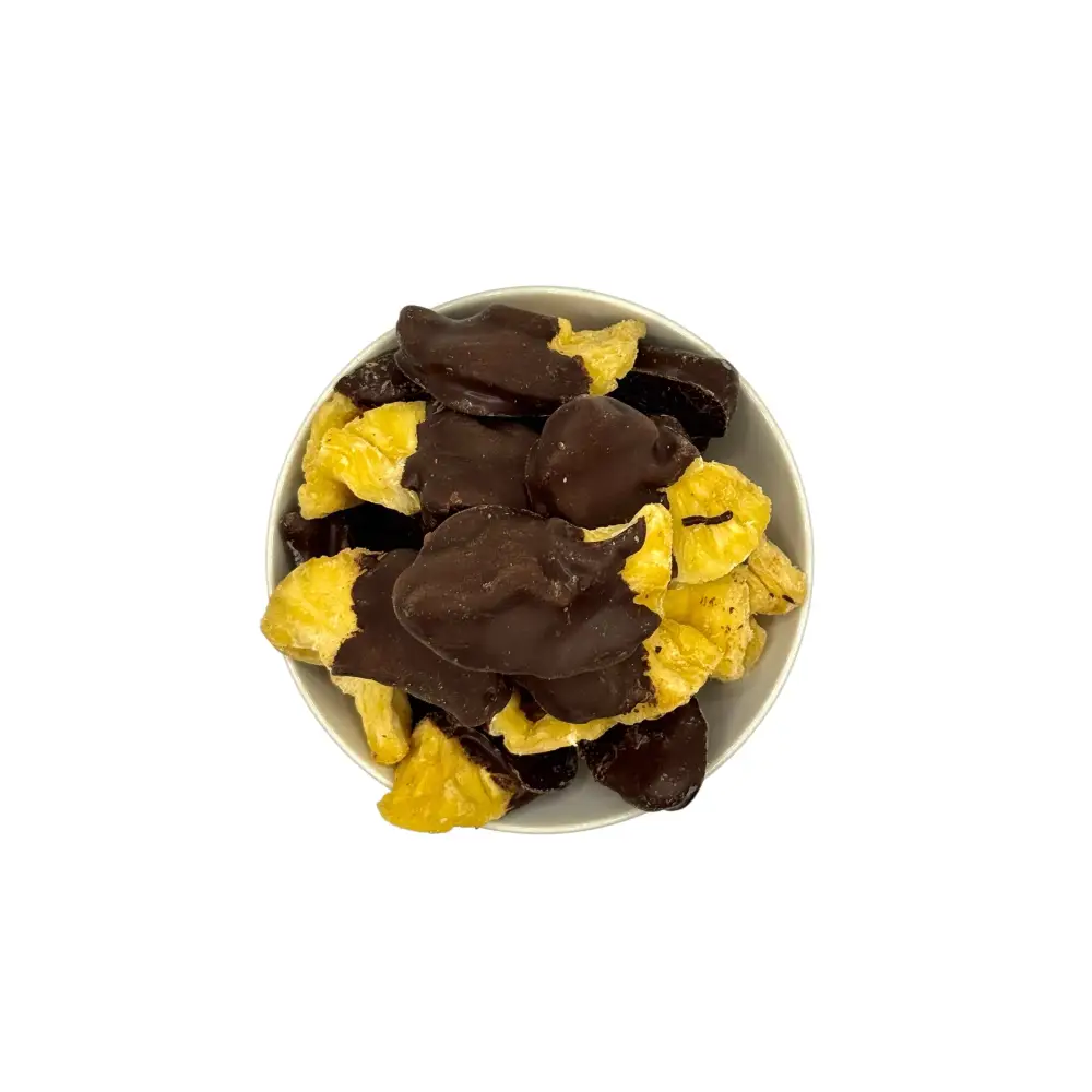 Ananas Stücke gedippt in Zartbitter Schokolade