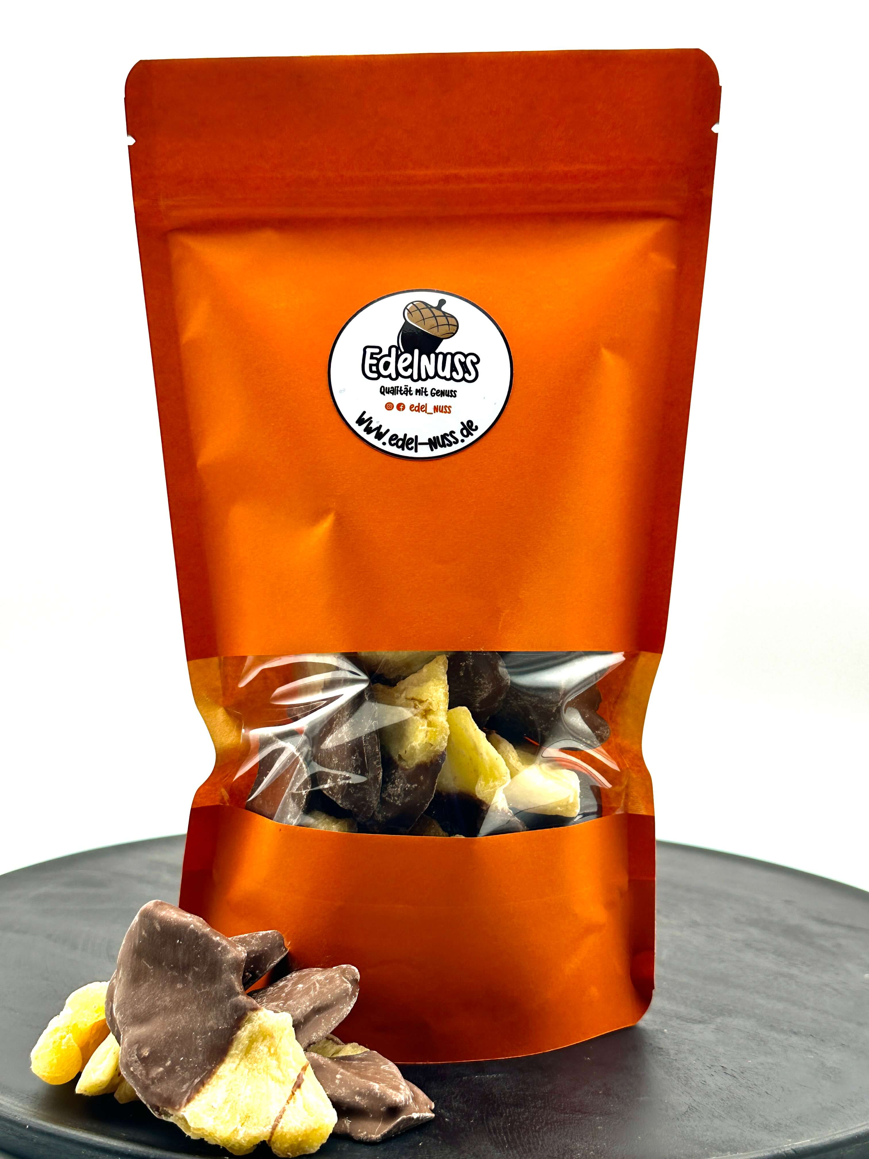 Kaufe getrocknete Ananas-Stücke in Vollmilch Schokolade bei Edel Nuss ... Kaufe getrocknete Ananas-Stücke in Vollmilch Schokolade bei Edel Nuss ...